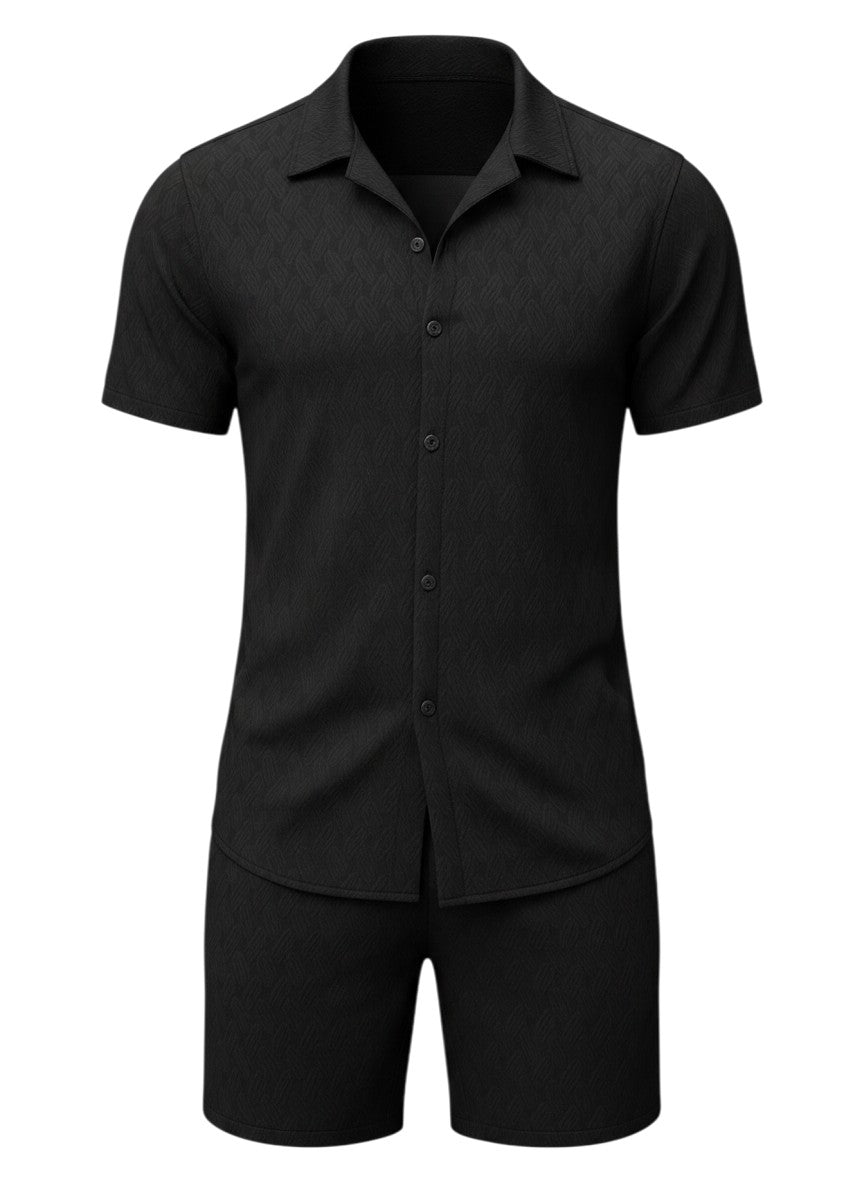 Ensemble Maison Bryzen noir composé d'une chemise à col classique et d'un short en tissu texturé léger.