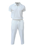 Ensemble Maison Bryzen blanc composé d'un polo à col zippé et d'un pantalon droit en tissu texturé extensible.