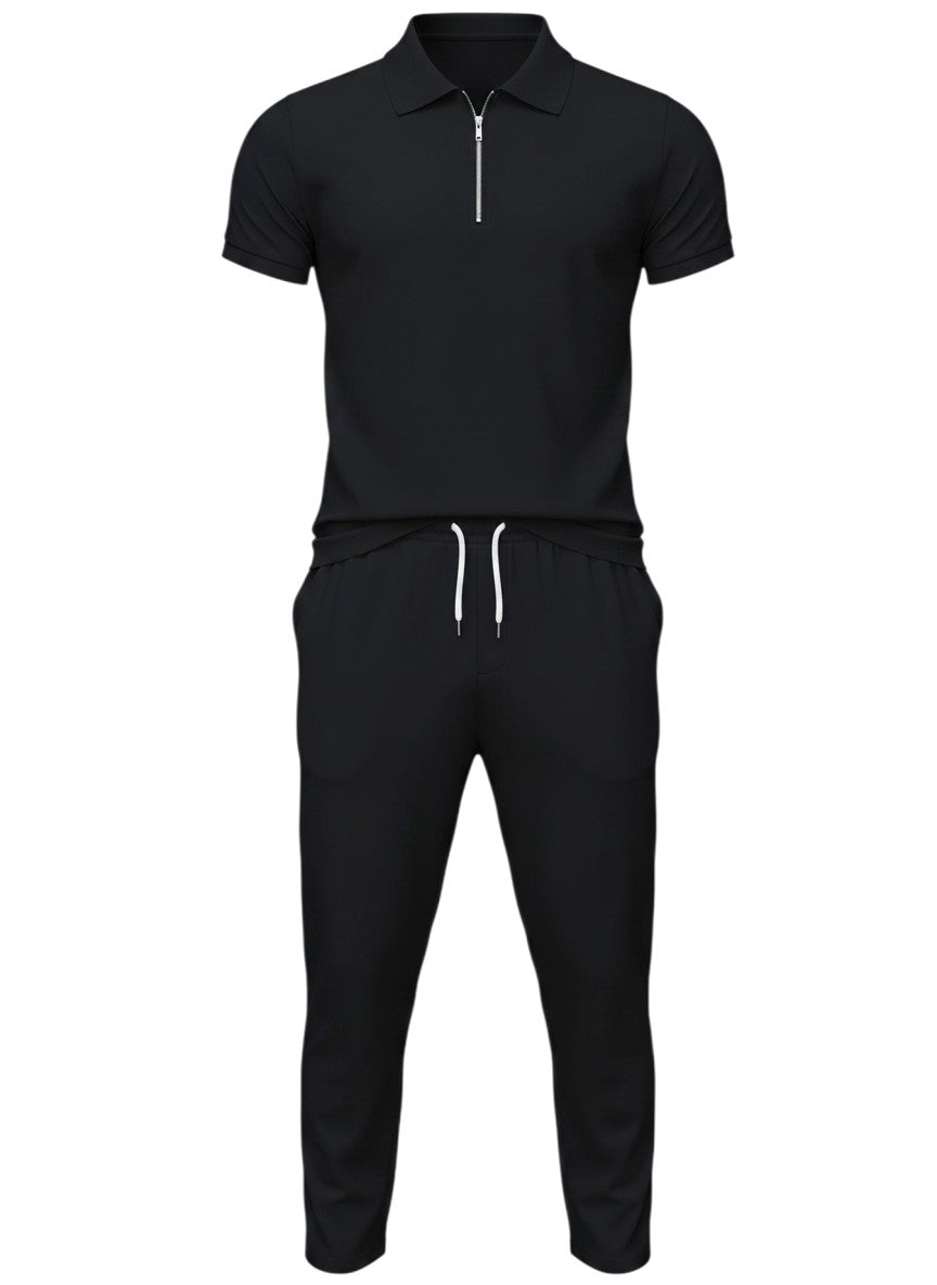 Ensemble Maison Bryzen noir composé d'un polo à col zippé et d'un pantalon droit avec cordon de serrage ajustable.